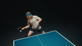 Man with long blond hair playing ping pong - Powered by Shutterstock - Get 15% off with code: PIKWIZARD15