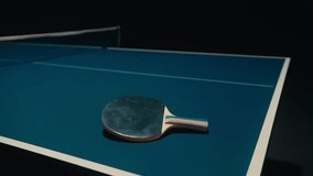 Top view of Table Tennis Players in a dark room - Powered by Shutterstock - Get 15% off with code: PIKWIZARD15