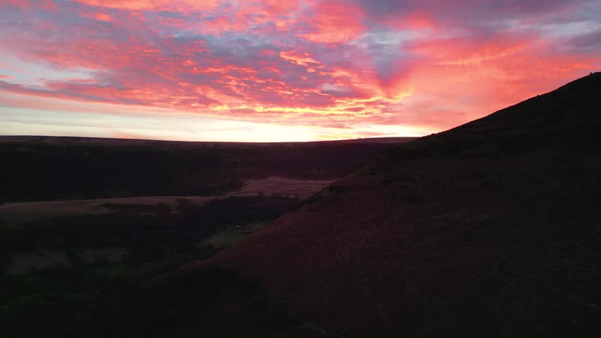 4K Drone video of Sunset at Hay Bluff, Black Mountains, Brecon Beacons National Park, Wales in February. Forward right rotation.