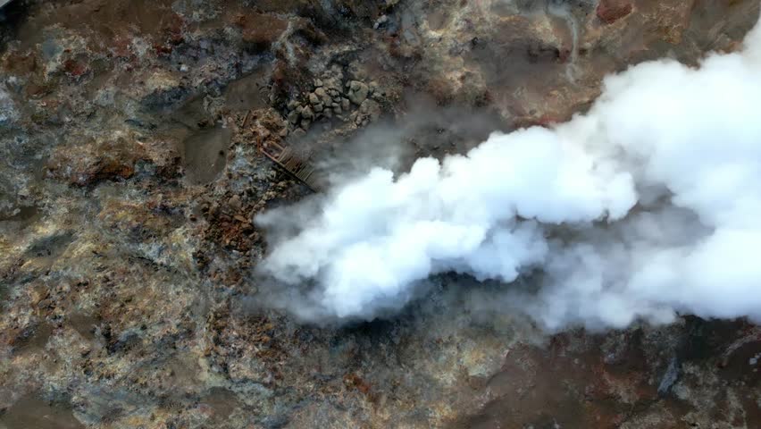 Top-down shot of an erupting geyser in Iceland