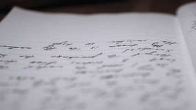 Man journaling thoughts into notebook. Personal Diary. Overcoming depression. Self help - Powered by Shutterstock - Get 15% off with code: PIKWIZARD15