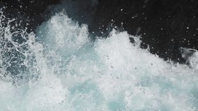 Dynamic shot of ocean waves crashing, with water splashing and foaming dramatically. Loop video. - Powered by Shutterstock - Get 15% off with code: PIKWIZARD15