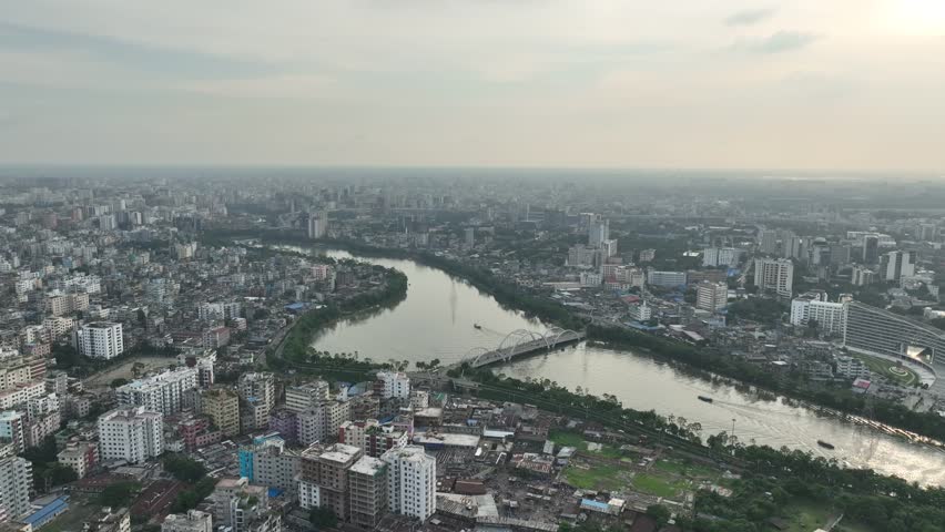 Dhaka is the capital city of Bangladesh, in southern Asia. Set beside the Buriganga River, it’s at the center of national government, trade and culture. The 17th-century old city was the Mughal capita