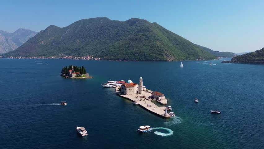 Aerial view of the artificial island of Our Lady of the Rocks (Gospa od Škrpjela) in the Bay of Kotor off the coast of Perast, Montenegro