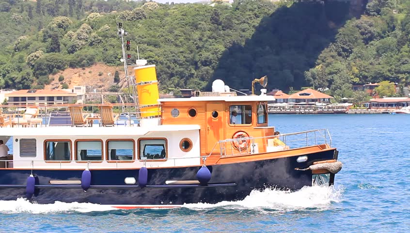 ISTANBUL - JUL 5: Bosporus Tour boat helps visitors to enjoy the city from the