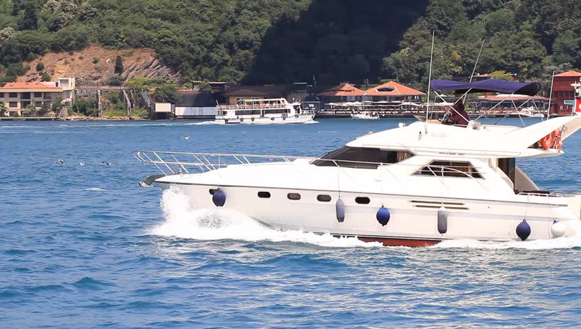 Luxury white yacht sails into Bosporus waters
