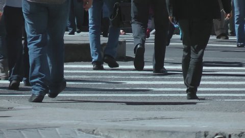 Pedestrians cross the street 
