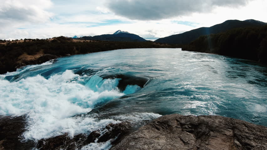 Rapid river flows in the mountains in Chile