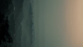 Vertical video - Misty morning timelapse of Borobudur temple, Indonesia - Powered by Shutterstock - Get 15% off with code: PIKWIZARD15