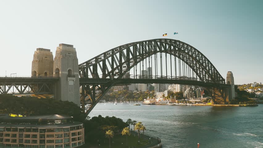 4K footage of Circular Quay and Sydney CBD with ferries and ships at golden hour in High Quality Cinematic