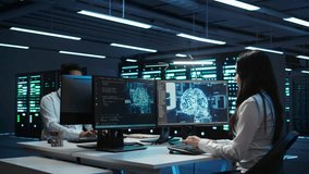 Team of engineers using AI tech on computer to do checkup in server room. Data center workers using artificial intelligence technology to process datasets for training, camera B - Powered by Shutterstock - Get 15% off with code: PIKWIZARD15