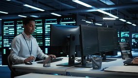 System administrator in wheelchair overseeing data center using computer, ensuring system can handle networking tasks. Person with paraplegia in server room tracking network traffic with PC - Powered by Shutterstock - Get 15% off with code: PIKWIZARD15