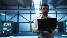 System administrator in data center managing servers, operating systems and software applications. Expert in server hub ensuring networks are secure, up to date, and functioning properly, camera B - Powered by Shutterstock - Get 15% off with code: PIKWIZARD15