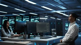 Admin in data center using augmented reality technology to ensure system can handle networking tasks. Server room worker looking at AR visualization hologram, tracking network traffic, camera B - Powered by Shutterstock - Get 15% off with code: PIKWIZARD15