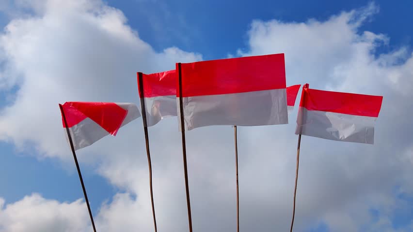 Bendera merah putih. Bendera Indonesia. Bendera negara Indonesia. The Indonesian flag symbolizing independence, on August 17 1945. 17 Agustus 1945. Red and white. Flag background. Flag fluttering