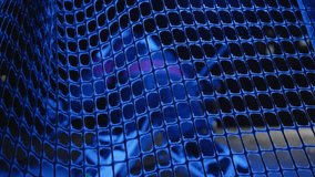 Workout butterfly drill Ice hockey goalie warms up with team players before start of match, focus on goal net. Goalkeeper goaltender movement. Ice arena with lights off. Gate net with blue light - Powered by Shutterstock - Get 15% off with code: PIKWIZARD15