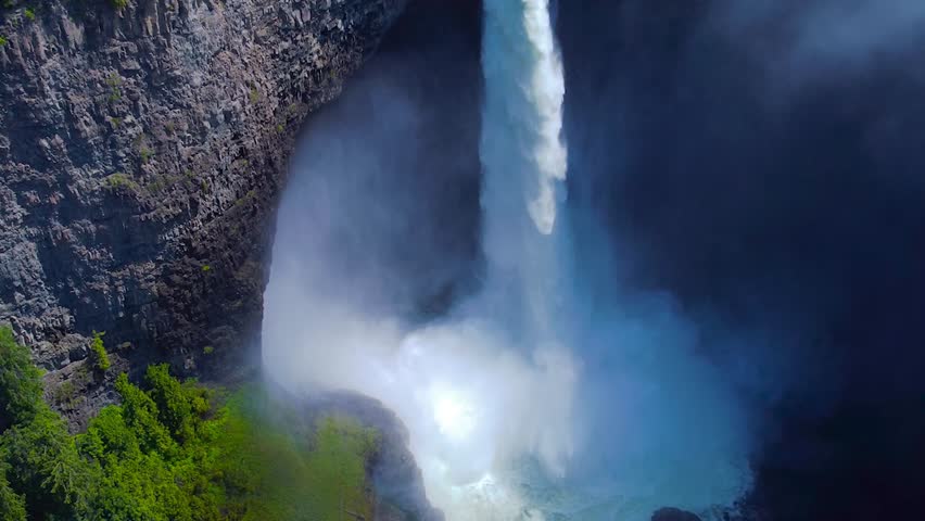 Wells Gray Waterfall in British Columbia, Canada. Amazing and Powerfull Stream, Fog and Splashing water 