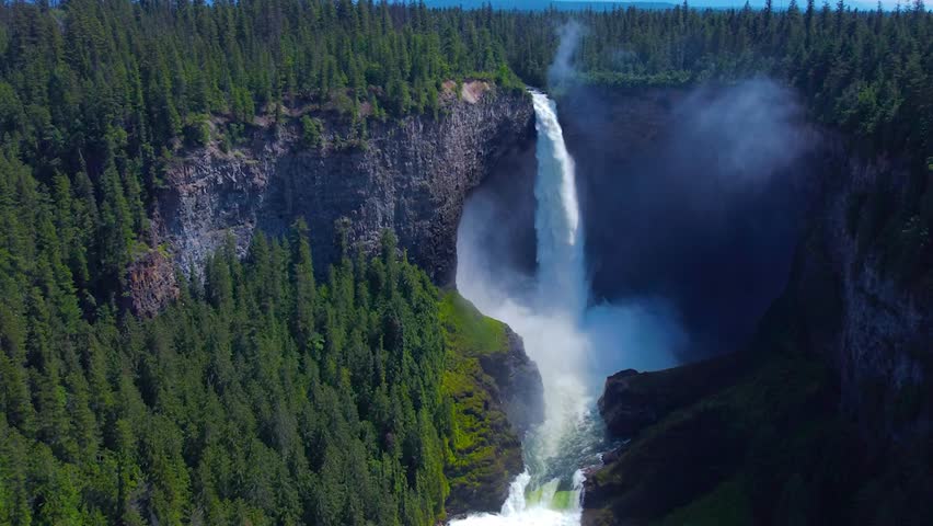 Wells Gray Waterfall in British Columbia, Canada. Amazing and Powerfull Stream, Fog and Splashing water 