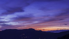 Before sunrise, the colorful clouds in the sky look like alien monsters coming. View of the mountains surrounding Emerald Reservoir. Xindian District, Taiwan. - Powered by Shutterstock - Get 15% off with code: PIKWIZARD15