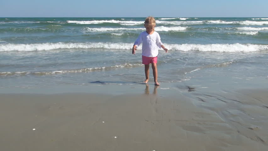 Child Playing in Sand on Beach, Little Girl Splashing in Sea Water, Children