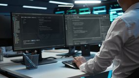 Data center system administrator responsible for installation of networking equipment solving tasks. IT employee at work doing maintenance on server room hardware, camera B - Powered by Shutterstock - Get 15% off with code: PIKWIZARD15