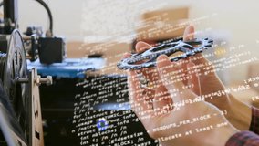 Animation of financial data processing over caucasian male mechnic working in workshop. Business, finances, computing, workshop and digital interface concept digitally generated video. - Powered by Shutterstock - Get 15% off with code: PIKWIZARD15