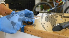 Animation of financial data processing over caucasian male mechnic working in workshop. Business, finances, computing, workshop and digital interface concept digitally generated video. - Powered by Shutterstock - Get 15% off with code: PIKWIZARD15