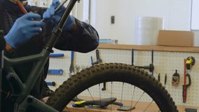 Animation of financial data processing over biracial male mechnic working in workshop. Business, finances, computing, workshop and digital interface concept digitally generated video. - Powered by Shutterstock - Get 15% off with code: PIKWIZARD15