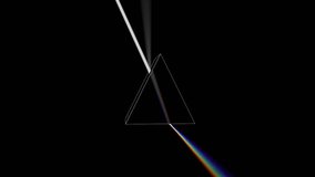 Animation of light beam hitting a moving glass prism, splitting into colorful rays, set against a dark background.
 - Powered by Shutterstock - Get 15% off with code: PIKWIZARD15