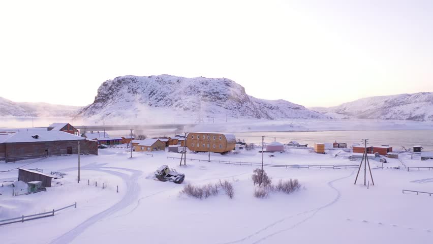 Teriberka village in winter season. Snowy landscape of Russian village on the North