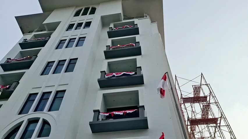 The national flag of Indonesia with the color red and white fluttering and Independence Day is celebrated every year on August 18. 