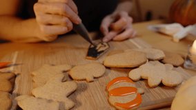 A Coffin with a Cross, Gingerbread Cookie Covered with Black Icing. Preparation for a Halloween Party. - Powered by Shutterstock - Get 15% off with code: PIKWIZARD15
