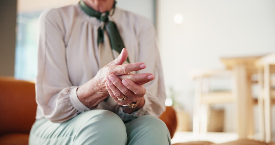 Senior woman, hand pain and arthritis for joint inflammation, medical problem and osteoporosis. Elderly person, finger massage and muscle injury in home with fibromyalgia, carpal tunnel risk and ache