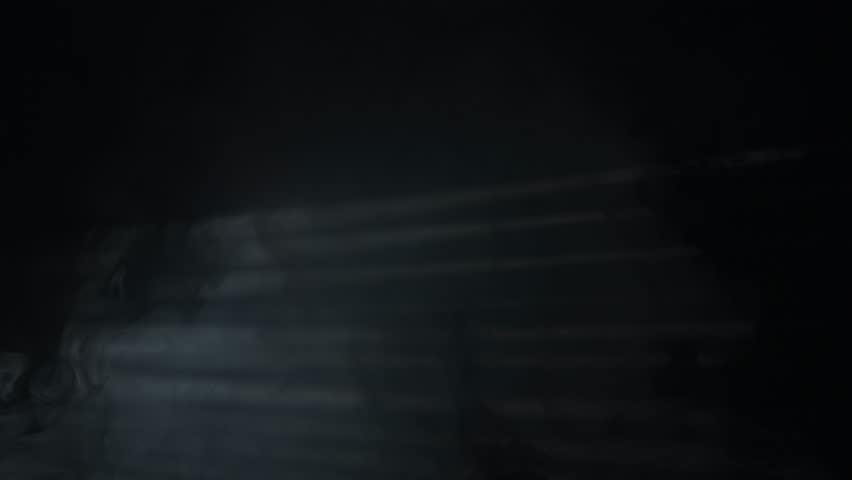 Mysterious portrait of man with light and shadow on face