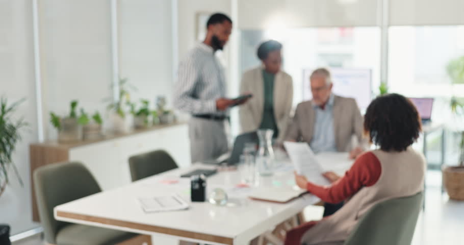 Business people, meeting and discussion with documents for collaboration, planning or brainstorming at office. Group, employees or team discussing paperwork or ideas for coporate project at workplace