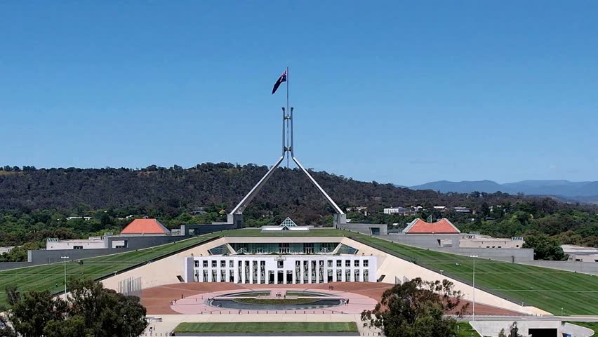 Aerial drone view of Australian Parliament House in Canberra, the capital city of Australia, on a sunny day