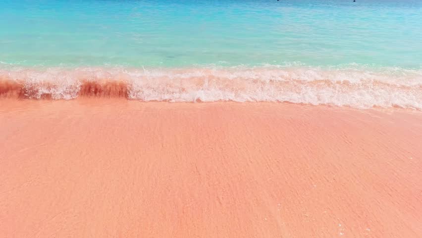 an exotic pink beach with a at Labuan Bajo
