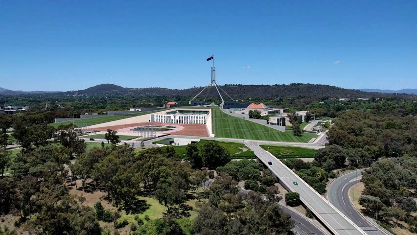 Aerial drone view of Australian Parliament House in Canberra, the capital city of Australia, on a sunny day