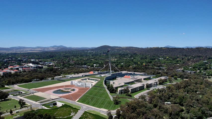 Aerial drone view of Australian Parliament House in Canberra, the capital city of Australia, on a sunny day