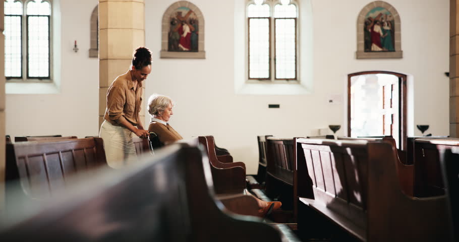 Senior, woman and wheelchair with caregiver in church for assistance, religion and christian service. Elderly person, walking or mobility support in chapel for spiritual sermon, helping or praise God