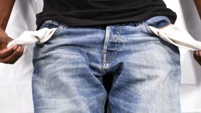man shows empty pockets bankrupt no money. poverty Finance business bankruptcy, man looking for money in his pockets. Guy in shows his empty pockets. Financial trouble, money loss, economy crisis asia - Powered by Shutterstock - Get 15% off with code: PIKWIZARD15