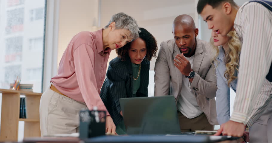 Business people, teamwork and meeting with laptop in office for network, testing or project review. Happy, developer and employees with technology at desk for server launch, deployment or programming