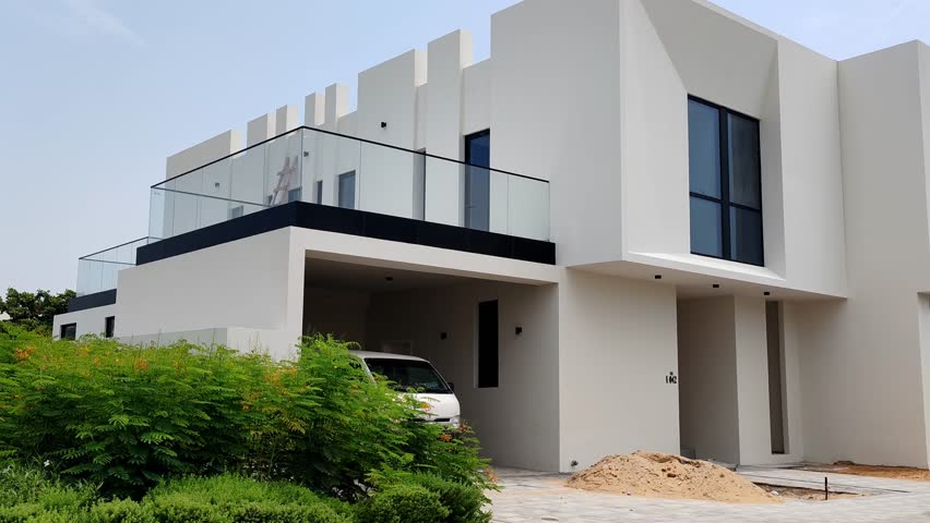 House or Villa's, Villa's with Cream color, Exterior view of 02 story house with modern design and having black glass windows, House or Villa's, Villa's with modern design
Residential Homes, Houses