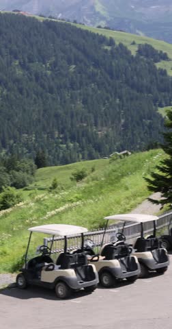  shot of a golf carts in the Swiss Alps