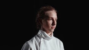 Self-Confident Sportswoman Fencer Putting Fencing Helmet For Protection Facts And Waiting For Fight - Powered by Shutterstock - Get 15% off with code: PIKWIZARD15