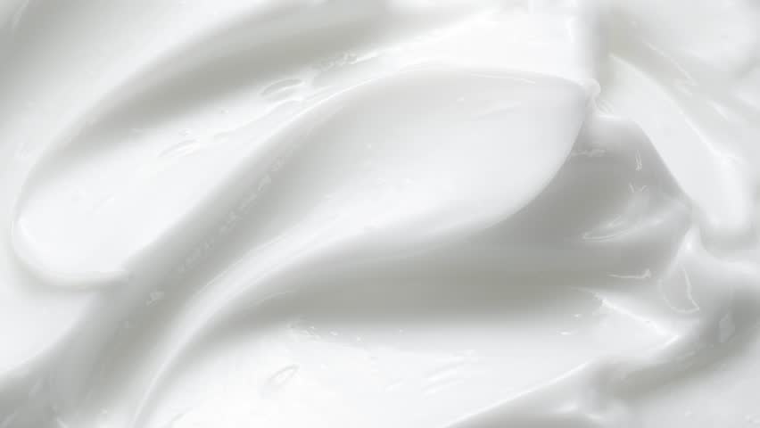 Macro white smooth eye, skin cream texture, closeup beauty facial cosmetics mask