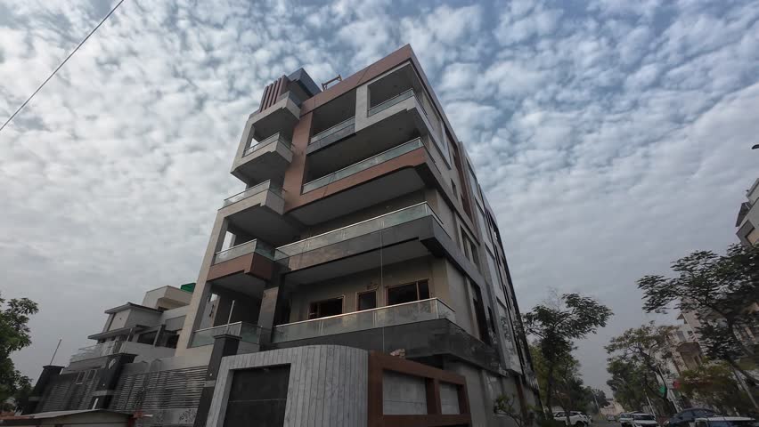 Exterior View of a Modern House Under Construction on a Breezy Morning