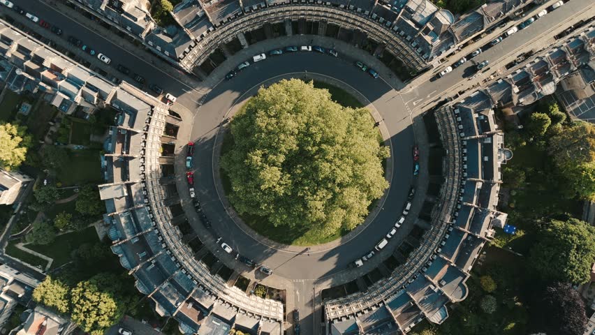 Birdseye Rotating View of Roundabout in Bath, England at Sunset