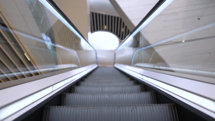 Escalator going up inside stadium at Parc des Princes home of Paris Saint Germain Football team, Wide view