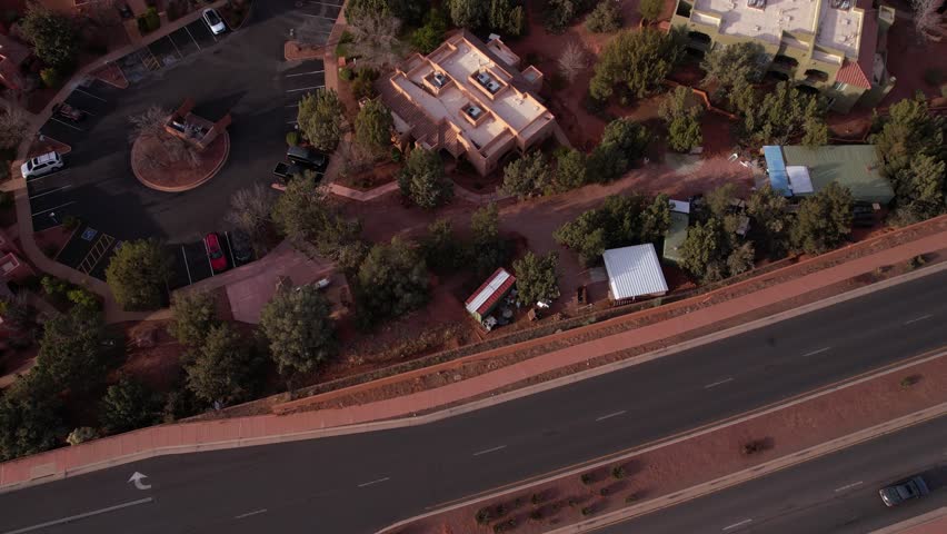 Sedona, Arizona USA. Revealing Drone Shot of Residential Neighborhood and Sandstone Hills in Desert Landscape